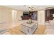 Large living room with a built-in entertainment center at 2006 Tanglewood Ne Dr, St Petersburg, FL 33702