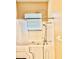 Bathroom featuring a walk-in tub, adjustable shower head, towel rack, and window with blinds at 23112 Emerson Way, Land O Lakes, FL 34639