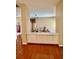 Bright living space with built-in cabinets with view to another living area at 23112 Emerson Way, Land O Lakes, FL 34639