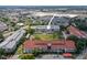 Community featuring meticulously kept landscaping, multiple buildings, and a shopping center at 2581 Countryside Blvd # 2309, Clearwater, FL 33761
