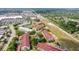 A great aerial view highlighting the condo complex and nearby shopping at 2581 Countryside Blvd # 2309, Clearwater, FL 33761