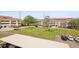 Community buildings with lawns, covered parking and resident parking lots at 2581 Countryside Blvd # 2309, Clearwater, FL 33761
