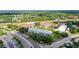 Community featuring meticulously kept landscaping, multiple buildings, and ample parking at 2581 Countryside Blvd # 2309, Clearwater, FL 33761