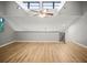 Bright bedroom featuring vaulted ceilings, light wood flooring and natural light at 2581 Countryside Blvd # 2309, Clearwater, FL 33761