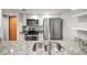 Kitchen featuring stainless steel appliances and granite countertops, plus a double sink at 2581 Countryside Blvd # 2309, Clearwater, FL 33761