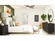 Bright bedroom features a large decorative mirror, seating, and minimalist décor at 2724 Bryce Ravine Ave, Plant City, FL 33563