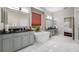 A luxurious bathroom featuring a soaking tub, double sinks, and modern finishes at 3000 Naughton Way, Tarpon Springs, FL 34688