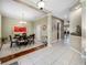 Spacious Dining room with a view of the foyer, hallway and an open floor plan at 3000 Naughton Way, Tarpon Springs, FL 34688
