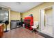 Laundry room with washer, dryer, cabinets, rolling toolbox, and tile floor at 3000 Naughton Way, Tarpon Springs, FL 34688