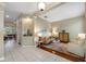 Inviting living room featuring a tan sofa, accent chairs, and stylish decor at 3000 Naughton Way, Tarpon Springs, FL 34688