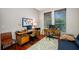 Bright office space featuring dual desks, modern decor, and natural light at 3000 Naughton Way, Tarpon Springs, FL 34688