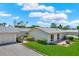 Aerial view of multiple single-story homes, garages, and green lawns at 3146 37Th S Ln # A, St Petersburg, FL 33711