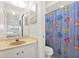 Clean bathroom with a mirror reflecting an adjacent bedroom at 3146 37Th S Ln # A, St Petersburg, FL 33711