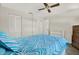 Nicely decorated bedroom with ceiling fan, closet and doorway to other rooms at 3146 37Th S Ln # A, St Petersburg, FL 33711