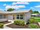 Well-maintained single-story home with manicured landscaping and a welcoming entrance at 3146 37Th S Ln # A, St Petersburg, FL 33711