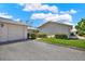 A single-story home with a detached one-car garage and green landscaping at 3146 37Th S Ln # A, St Petersburg, FL 33711