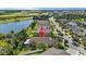 Aerial view showcasing the home and surrounding area with water features nearby at 32193 Watoga Loop, Wesley Chapel, FL 33543