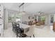 A large open-concept room combining the dining area with the living room for an inviting atmosphere at 32193 Watoga Loop, Wesley Chapel, FL 33543