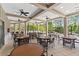 Covered outdoor patio with tables and seating, perfect for community gatherings at 32193 Watoga Loop, Wesley Chapel, FL 33543