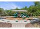 Community playground featuring slides and climbing structures for outdoor fun at 32193 Watoga Loop, Wesley Chapel, FL 33543