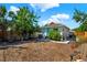 Private backyard area features mature trees, ample seating, and a well-maintained lawn at 3230 4Th S Ave, St Petersburg, FL 33712