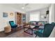 Comfortable living room with large sectional sofa, decorative pillows, and a modern rug at 3230 4Th S Ave, St Petersburg, FL 33712