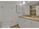Clean bathroom with a vanity and cabinet storage, featuring a glass-enclosed shower for a modern touch at 3268 39Th S St # A, St Petersburg, FL 33711