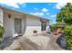 Inviting home entrance with decorative chairs and landscaping at 3268 39Th S St # A, St Petersburg, FL 33711
