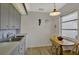 Cozy kitchen nook with a small wood table set by a window, perfect for casual dining at 3268 39Th S St # A, St Petersburg, FL 33711