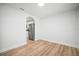 Dining space showcasing the wood flooring and views of the kitchen at 3908 Douglas Hill Pl, Parrish, FL 34219