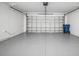 Large garage with ample space for vehicles and storage at 3908 Douglas Hill Pl, Parrish, FL 34219