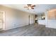 Spacious living room with tile floors flowing seamlessly into a modern kitchen at 4345 Bayside Village Dr # 303, Tampa, FL 33615