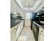 Kitchen equipped with modern appliances and ample counter space at 4611 W North B St # 125, Tampa, FL 33609