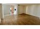 Open-concept living room with neutral walls and wood-look floors at 4611 W North B St # 125, Tampa, FL 33609