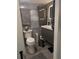 Tastefully updated bathroom showcasing a modern vanity, sleek fixtures, and gray tile at 4705 Ne 1St Ne St # 327, St Petersburg, FL 33703