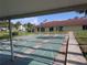 Well-maintained shuffleboard courts with a view of the clubhouse, offering recreational activities at 4705 Ne 1St Ne St # 327, St Petersburg, FL 33703
