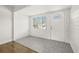 Bright foyer with tiled flooring, shiplap walls, and a charming front door at 4755 21St N Ave, St Petersburg, FL 33713