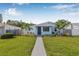 Charming single-story home with a well-manicured lawn and inviting walkway at 4755 21St N Ave, St Petersburg, FL 33713