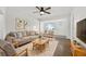 Cozy living room featuring a comfortable sofa, stylish decor, and natural light at 4755 21St N Ave, St Petersburg, FL 33713