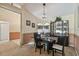 Inviting dining space features stylish furnishings, ample natural light, and a seamless transition to the rest of the home at 5112 Parkway Blvd, Land O Lakes, FL 34639