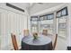Cozy dining area filled with natural light and featuring a table and chairs for intimate meals and gatherings at 5112 Parkway Blvd, Land O Lakes, FL 34639