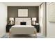 Warm, cozy bedroom featuring a comfy bed, art prints, and neutral color palette at 5724 Red Kite Dr, Wimauma, FL 33598