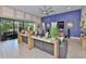 Inviting living room with a sectional sofa and plenty of natural light at 6016 Shadowlake Dr, Apollo Beach, FL 33572