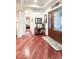 Elegant entryway with hardwood floors and decorative details, creating a welcoming ambiance at 6801 S Sparkman St, Tampa, FL 33616