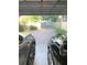 View from the garage looking out onto the paver driveway at 6801 S Sparkman St, Tampa, FL 33616