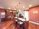 Spacious kitchen featuring a granite countertop island with seating and stainless steel appliances at 6801 S Sparkman St, Tampa, FL 33616