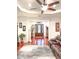 A spacious living room showcasing the hardwood floors and natural lighting at 6801 S Sparkman St, Tampa, FL 33616