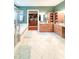 Bright main bathroom with double sinks, soaking tub, and a separate walk-in shower at 6801 S Sparkman St, Tampa, FL 33616