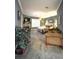 Cozy main bedroom featuring a fireplace, plantation shutters, and neutral paint at 6801 S Sparkman St, Tampa, FL 33616