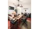 Spacious office with a ceiling fan, sofa, and desk with plenty of room for work at 6801 S Sparkman St, Tampa, FL 33616